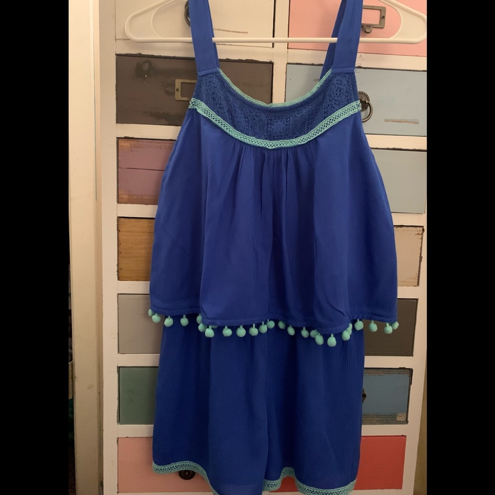 Royal blue and mint green pom pom romper.